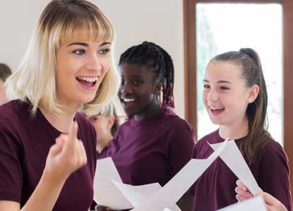 School children learning to sing