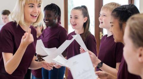 School children learning to sing